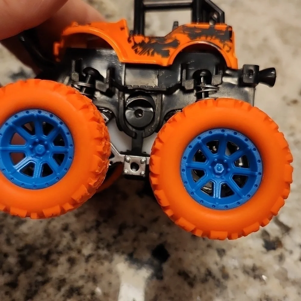 Jeep monster truck reve up car orange black